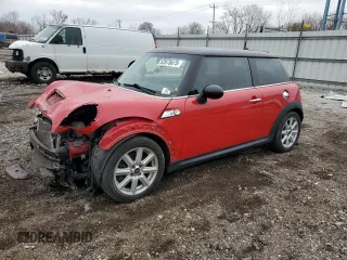 2012 MINI Hardtop S with VIN WMWSV3C59CT385254, listed as a Copart auction lot 52675675 with 76,250 mi miles and Salvage Title. Bid and sale history available at DreamBid. Image 1.