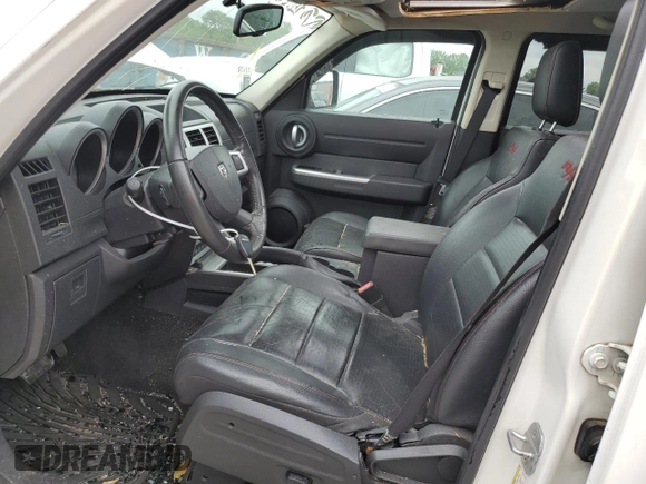 2007 Dodge Nitro R/T z VIN 1D8GT58657W723623, wystawiony jako Copart lot #58917835 z przebiegiem 131 362 mil mil oraz Szkoda całkowita • Salvage title. Historia ofert i sprzedaży dostępna na DreamBid. Obrazek 7.