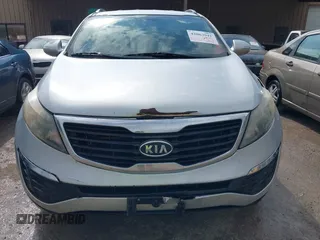 2011 Kia Sportage LX with VIN KNDPB3A23B7053943, listed as a IAAI auction lot 42063941 with 234,364 mi miles and . Bid and sale history available at carsss.com. Image 6.