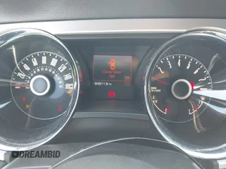 2014 Ford Mustang V6 with VIN 1ZVBP8AM3E5225590, listed as a IAAI auction lot 42148999 with 94,911 mi miles and . Bid and sale history available at DreamBid. Image 7.