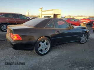 1999 Mercedes-Benz SL-Class with VIN WDBFA68F9XF178143, listed as a Copart auction lot 83255114 with 129,970 mi miles and Salvage Title. Bid and sale history available at carsss.com. Image 3.