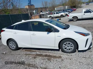 2022 Toyota Prius L Eco with VIN JTDKAMFUXN3159170, listed as a IAAI auction lot 41930288 with 53,414 mi miles and . Bid and sale history available at DreamBid. Image 13.