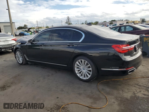 2018 BMW 7 Series 740i with VIN WBA7E2C59JB216290, listed as a Copart auction lot 89082215 with 56,020 mi miles and Salvage Title. Bid and sale history available at carsss.com. Image 2.