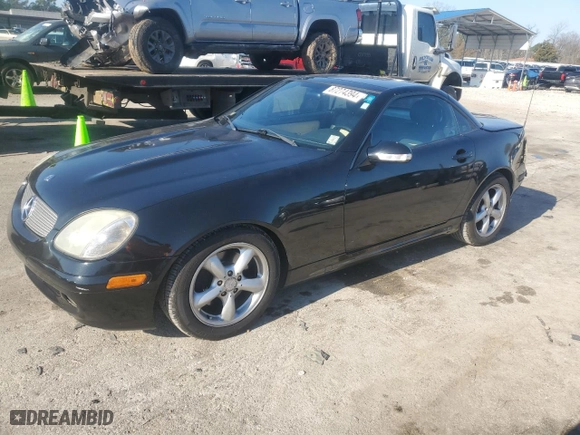 2001 Mercedes-Benz SLK-Class with VIN WDBKK65F41F182382, listed as a Copart auction lot 87274394 with NaN miles and Salvage Title. Bid and sale history available at carsss.com. Image 1.