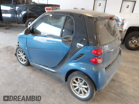 2009 Smart fortwo Pure with VIN WMEEJ31X89K228315, listed as a IAAI auction lot 42662931 with 60,666 mi miles and . Bid and sale history available at DreamBid. Image 3.