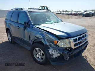 2011 Ford Escape Hybrid z VIN 1FMCU4K34BKA60771, wystawiony jako IAAI lot #42283654 z przebiegiem 158 570 mil mil oraz . Historia ofert i sprzedaży dostępna na DreamBid. Obrazek 1.