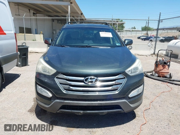2014 Hyundai Santa Fe with VIN 5XYZUDLB9EG169614, listed as a IAAI auction lot 42208166 with 139,103 mi miles and . Bid and sale history available at DreamBid. Image 12.
