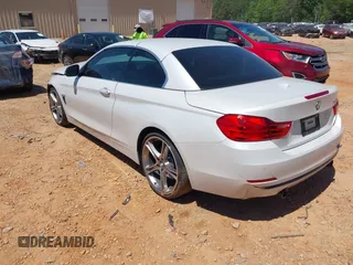 2014 BMW 4 Series 435i z VIN WBA3T3C5XEP737022, wystawiony jako IAAI lot #42135541 z przebiegiem 70 080 mil mil oraz . Historia ofert i sprzedaży dostępna na DreamBid. Obrazek 3.