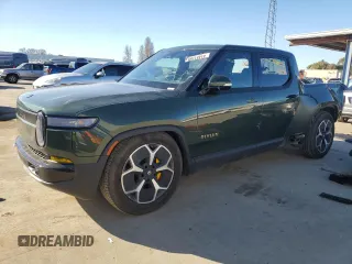 2023 Rivian R1T Adventure with VIN 7FCTGAAA7PN024633, listed as a Copart auction lot 41481365 with 24,965 mi miles and Salvage Title. Bid and sale history available at carsss.com. Image 1.