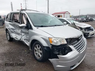 2010 Chrysler Town & Country Touring with VIN 2A4RR5D14AR293299, listed as a IAAI auction lot 41184584 with 245,928 mi miles. Bid and sale history available at carsss.com. Image 1.