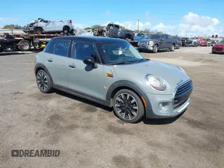 2018 MINI Hardtop 4 Door Cooper with VIN WMWXU1C5XJ2F80038, listed as a IAAI auction lot 40849170 with 66,048 mi miles and . Bid and sale history available at DreamBid. Image 1.