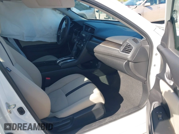 2020 Honda Civic LX z VIN 19XFC2F68LE206395, wystawiony jako IAAI lot #41720356 z przebiegiem 38 037 mil mil oraz . Historia ofert i sprzedaży dostępna na DreamBid. Obrazek 5.