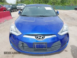 2014 Hyundai Veloster with VIN KMHTC6AD2EU184927, listed as a IAAI auction lot 42133499 with 103,499 mi miles. Bid and sale history available at carsss.com. Image 6.