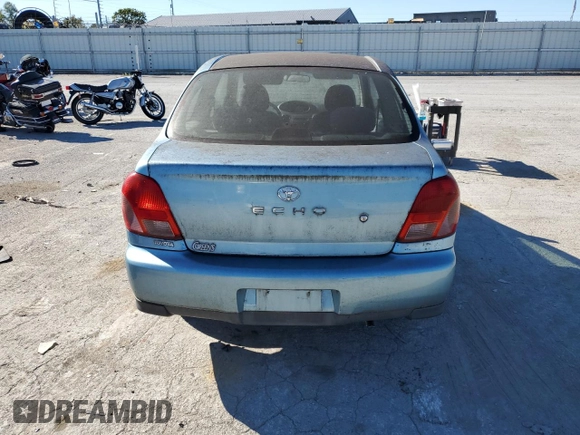 2000 Toyota ECHO with VIN JTDAT1230Y0098418, listed as a Copart auction lot 71919434 with 69,644 mi miles and Clean Title. Bid and sale history available at DreamBid. Image 6.