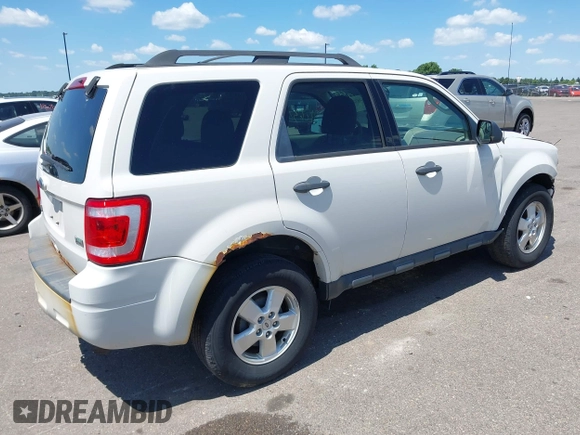 2011 Ford Escape XLT z VIN 1FMCU9DG3BKB24876, wystawiony jako IAAI lot #42632258 z przebiegiem 164 761 mil mil oraz . Historia ofert i sprzedaży dostępna na DreamBid. Obrazek 4.
