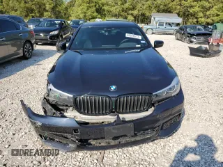 2019 BMW 7 Series 740i with VIN WBA7E2C50KB216499, listed as a Copart auction lot 68828673 with 94,549 mi miles. Bid and sale history available at carsss.com. Image 5.