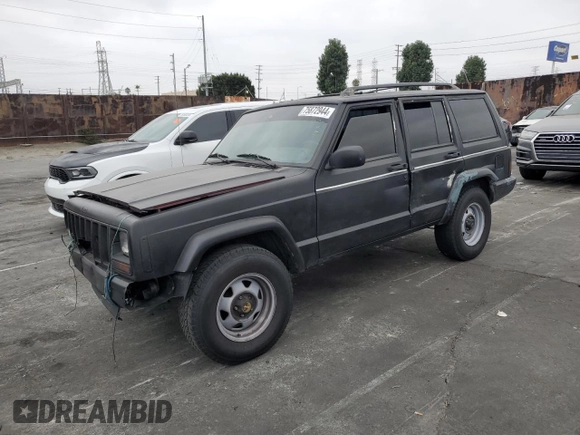 1998 Jeep Cherokee SE with VIN 1J4FT28S1WL203077, listed as a Copart auction lot 75872944 with 184,840 mi miles and Salvage Title. Bid and sale history available at carsss.com. Image 1.