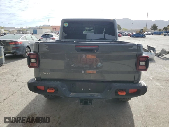 2023 Jeep Gladiator Mojave z VIN 1C6JJTEG7PL548084, wystawiony jako Copart lot #52827265 z przebiegiem 26 789 mil mil oraz Czysty tytuł • Clean title. Historia ofert i sprzedaży dostępna na DreamBid. Obrazek 6.
