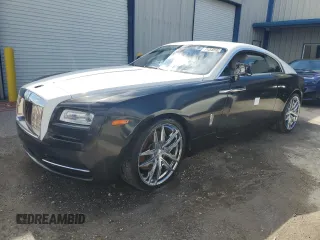 2014 Rolls-Royce Wraith z VIN SCA665C59EUX84411, wystawiony jako Copart lot #74548964 z przebiegiem Nie podano mil oraz Nie do naprawy. Historia ofert i sprzedaży dostępna na DreamBid. Obrazek 1.