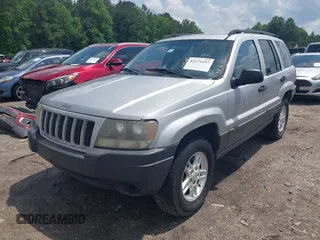 2004 Jeep Grand Cherokee Laredo with VIN 1J4GX48N04C435603, listed as a IAAI auction lot 42274197 with 256,163 mi miles and . Bid and sale history available at DreamBid. Image 17.