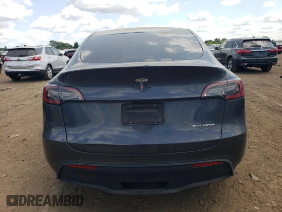 2022 Tesla Model Y Long Range with VIN 7SAYGDEE3NA007737, listed as a Copart auction lot 64602984 with 42,597 mi miles and Salvage Title. Bid and sale history available at carsss.com. Image 6.