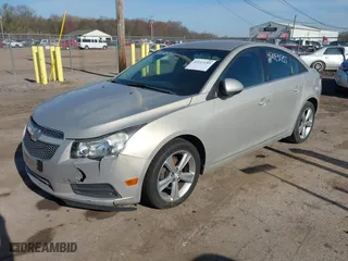 2012 Chevrolet Cruze LT w/2LT with VIN 1G1PG5SC9C7144150, listed as a IAAI auction lot 42113185 with 152,398 mi miles. Bid and sale history available at carsss.com. Image 2.