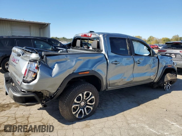 2024 GMC Canyon 4WD AT4 with VIN 1GTP6DEK8R1264699, listed as a Copart auction lot 76604464 with 2,406 mi miles and Salvage Title. Bid and sale history available at carsss.com. Image 3.