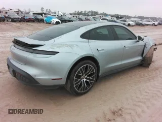 2021 Porsche Taycan z VIN WP0AA2Y14MSA18735, wystawiony jako Copart lot #72616054 z przebiegiem Nie podano mil oraz Szkoda całkowita • Salvage title. Historia ofert i sprzedaży dostępna na DreamBid. Obrazek 3.