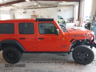 2023 Jeep Wrangler Sport with VIN 1C4HJXDG7PW676453, listed as a IAAI auction lot 42222995 with 32,347 mi miles and . Bid and sale history available at DreamBid. Image 13.