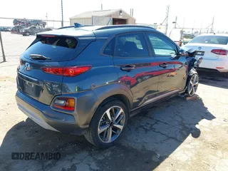 2019 Hyundai Kona Limited with VIN KM8K33A57KU223932, listed as a IAAI auction lot 41869416 with 102,424 mi miles. Bid and sale history available at carsss.com. Image 4.