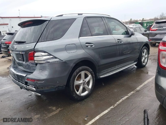 2017 Mercedes-Benz GLE with VIN 4JGDA5HB9HA992609, listed as a IAAI auction lot 41724638 with 205,921 mi miles. Bid and sale history available at carsss.com. Image 4.