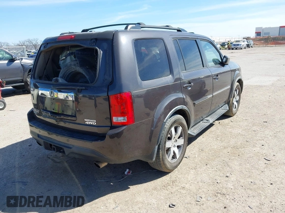 2012 Honda Pilot Touring with VIN 5FNYF4H99CB069996, listed as a IAAI auction lot 41809046 with 140,836 mi miles and . Bid and sale history available at DreamBid. Image 4.