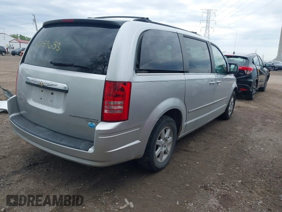 2010 Chrysler Town & Country Touring z VIN 2A4RR5D16AR305744, wystawiony jako IAAI lot #42159653 z przebiegiem 189 993 mil mil oraz . Historia ofert i sprzedaży dostępna na DreamBid. Obrazek 4.