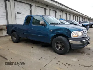 2000 Ford F-150 XL with VIN 1FTRX17W5YNA58235, listed as a Copart auction lot 84026504 with 0 mi miles and Salvage Title. Bid and sale history available at carsss.com. Image 4.