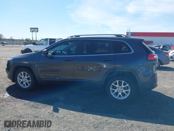 2017 Jeep Cherokee Latitude with VIN 1C4PJLCBXHW572714, listed as a IAAI auction lot 41861087 with 120,552 mi miles and . Bid and sale history available at DreamBid. Image 14.