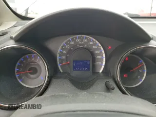 2013 Honda Fit Sport z VIN LUCGE8H70D3007465, wystawiony jako Copart lot #53542045 z przebiegiem 223 335 mil mil oraz Szkoda całkowita • Salvage title. Historia ofert i sprzedaży dostępna na DreamBid. Obrazek 9.