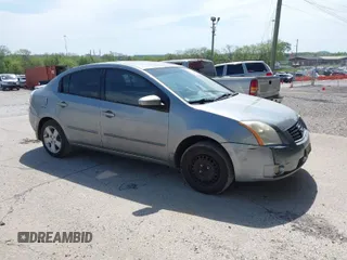 2009 Nissan Sentra S FE+ z VIN 3N1AB61E99L671293, wystawiony jako IAAI lot #42042248 z przebiegiem 126 899 mil mil oraz . Historia ofert i sprzedaży dostępna na DreamBid. Obrazek 1.