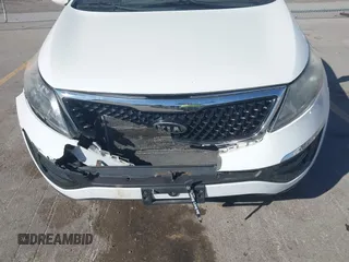 2015 Kia Sportage LX with VIN KNDPBCAC8F7690843, listed as a IAAI auction lot 41813154 with 124,885 mi miles and . Bid and sale history available at carsss.com. Image 6.