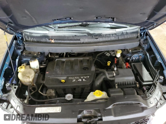 2013 Dodge Journey American Value with VIN 3C4PDCAB4DT581984, listed as a Copart auction lot 59953515 with 166,927 mi miles and Salvage title. Bid and sale history available at DreamBid. Image 12.