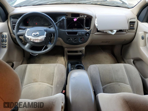 2002 Mazda Tribute LX with VIN 4F2YU09122KM55085, listed as a Copart auction lot 71604184 with 185,158 mi miles and Salvage Title. Bid and sale history available at DreamBid. Image 8.