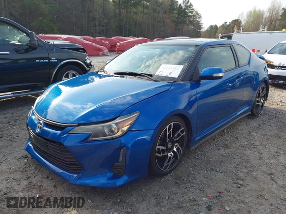 2014 Scion tC with VIN JTKJF5C72E3086001, listed as a IAAI auction lot 41721986 with 207,239 mi miles. Bid and sale history available at carsss.com. Image 19.