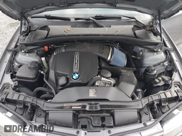 2012 BMW 1 Series 135i with VIN WBAUN7C59CVM26082, listed as a Copart auction lot 74711754 with 77,152 mi miles and Salvage title. Bid and sale history available at DreamBid. Image 11.
