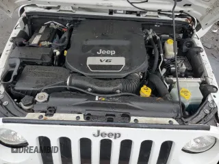2018 Jeep Wrangler Unlimited Sport S z VIN 1C4BJWDG1JL855855, wystawiony jako Copart lot #56907455 z przebiegiem 61 437 mil mil oraz Szkoda całkowita • Salvage title. Historia ofert i sprzedaży dostępna na DreamBid. Obrazek 11.