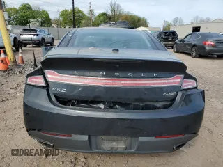 2013 Lincoln MKZ z VIN 3LN6L2J90DR818503, wystawiony jako Copart lot #54716715 z przebiegiem 114 227 mil mil oraz Szkody całkowita. Historia ofert i sprzedaży dostępna na DreamBid. Obrazek 6.