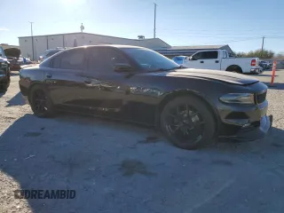 2015 Dodge Charger SXT with VIN 2C3CDXHG8FH769883, listed as a Copart auction lot 87723825 with 81,859 mi miles and Salvage Title. Bid and sale history available at DreamBid. Image 4.