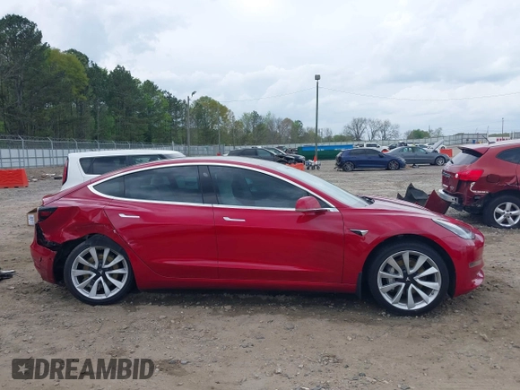 2019 Tesla Model 3 Mid Range z VIN 5YJ3E1EA7KF445040, wystawiony jako IAAI lot #41954956 z przebiegiem 68 004 mil mil oraz . Historia ofert i sprzedaży dostępna na DreamBid. Obrazek 13.