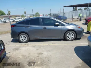 2022 Toyota Prius L Eco with VIN JTDKAMFU5N3160694, listed as a IAAI auction lot 41874909 with 80,376 mi miles. Bid and sale history available at carsss.com. Image 13.