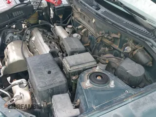 2000 Toyota RAV4 with VIN JT3GP10V8Y0043447, listed as a IAAI auction lot 42658380 with 186,193 mi miles and . Bid and sale history available at DreamBid. Image 13.