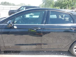 2017 Ford Fusion SE z VIN 3FA6P0HDXHR198388, wystawiony jako IAAI lot #42231069 z przebiegiem 143 709 mil mil oraz . Historia ofert i sprzedaży dostępna na DreamBid. Obrazek 13.