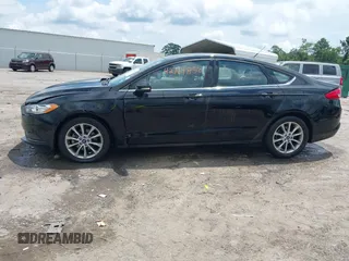 2017 Ford Fusion SE z VIN 3FA6P0H71HR363643, wystawiony jako IAAI lot #42764856 z przebiegiem 82 805 mil mil oraz . Historia ofert i sprzedaży dostępna na DreamBid. Obrazek 14.